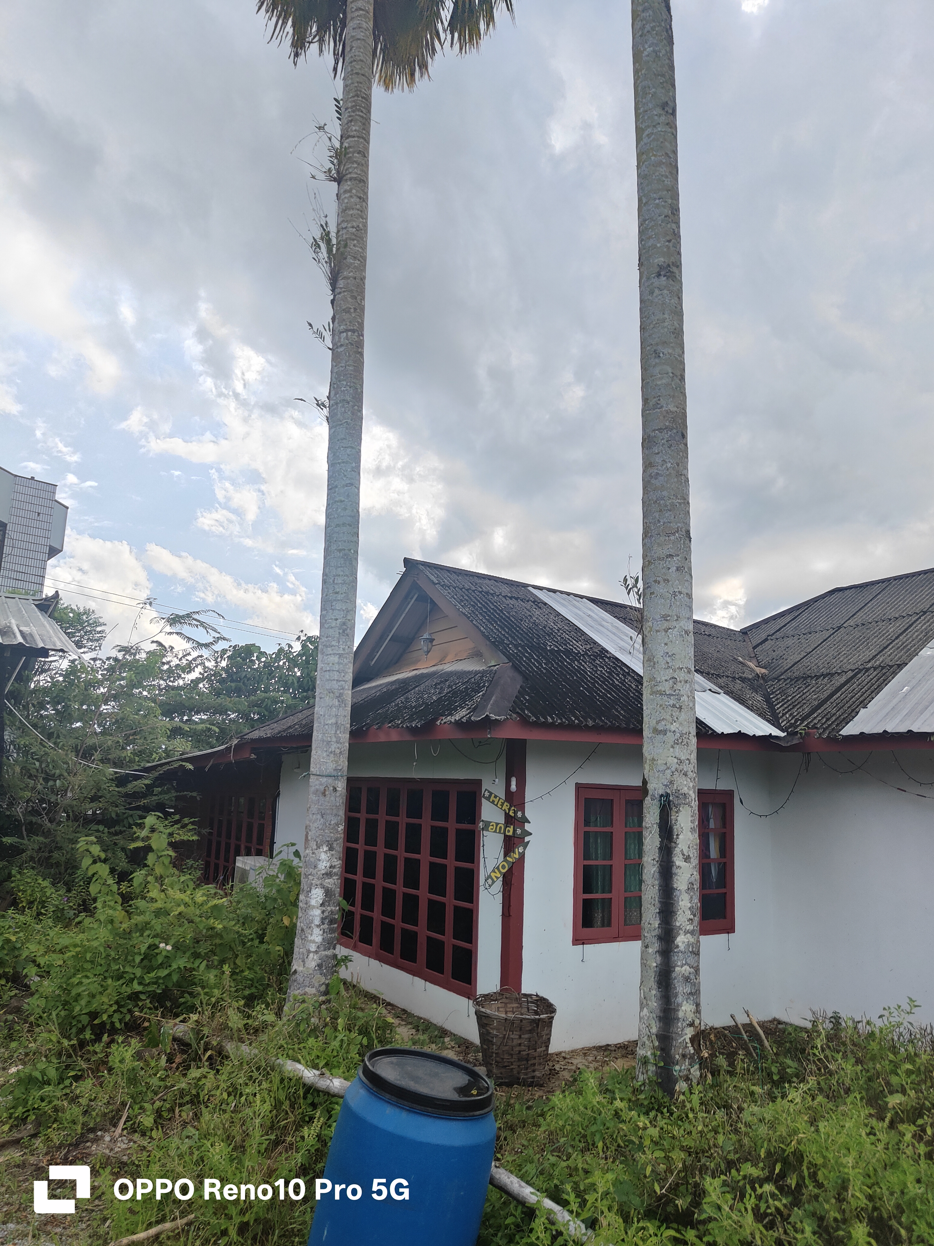 John Cottage exterior before roofing work, Serian