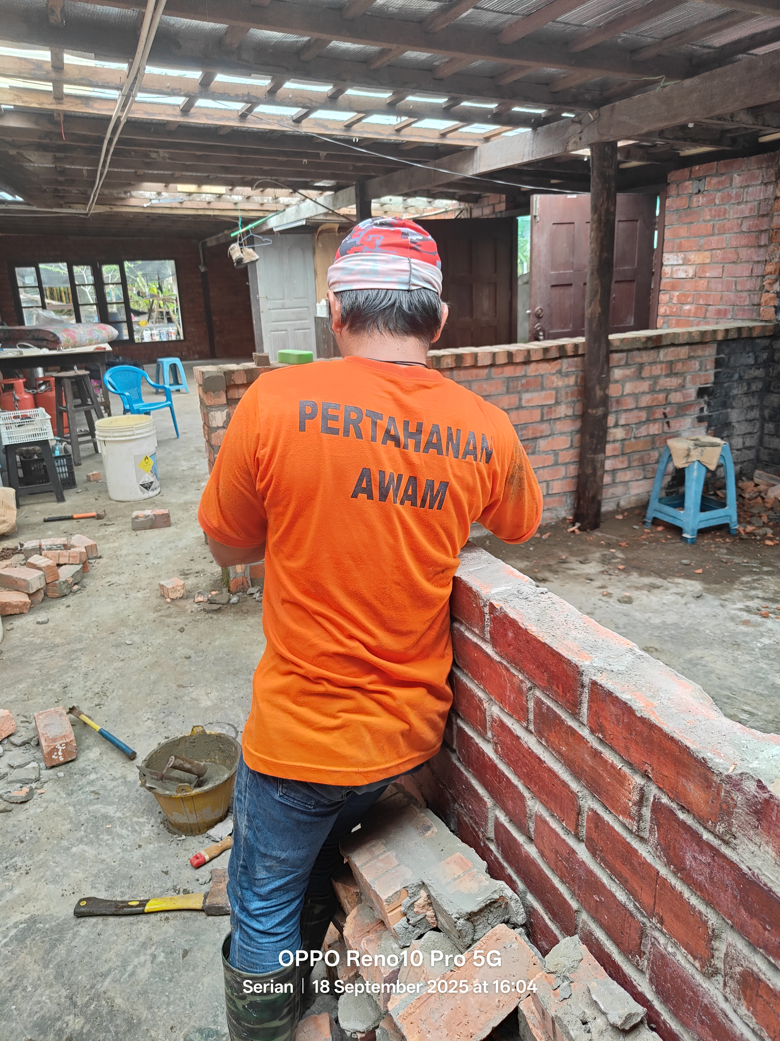 Bricklaying construction at John Cottage